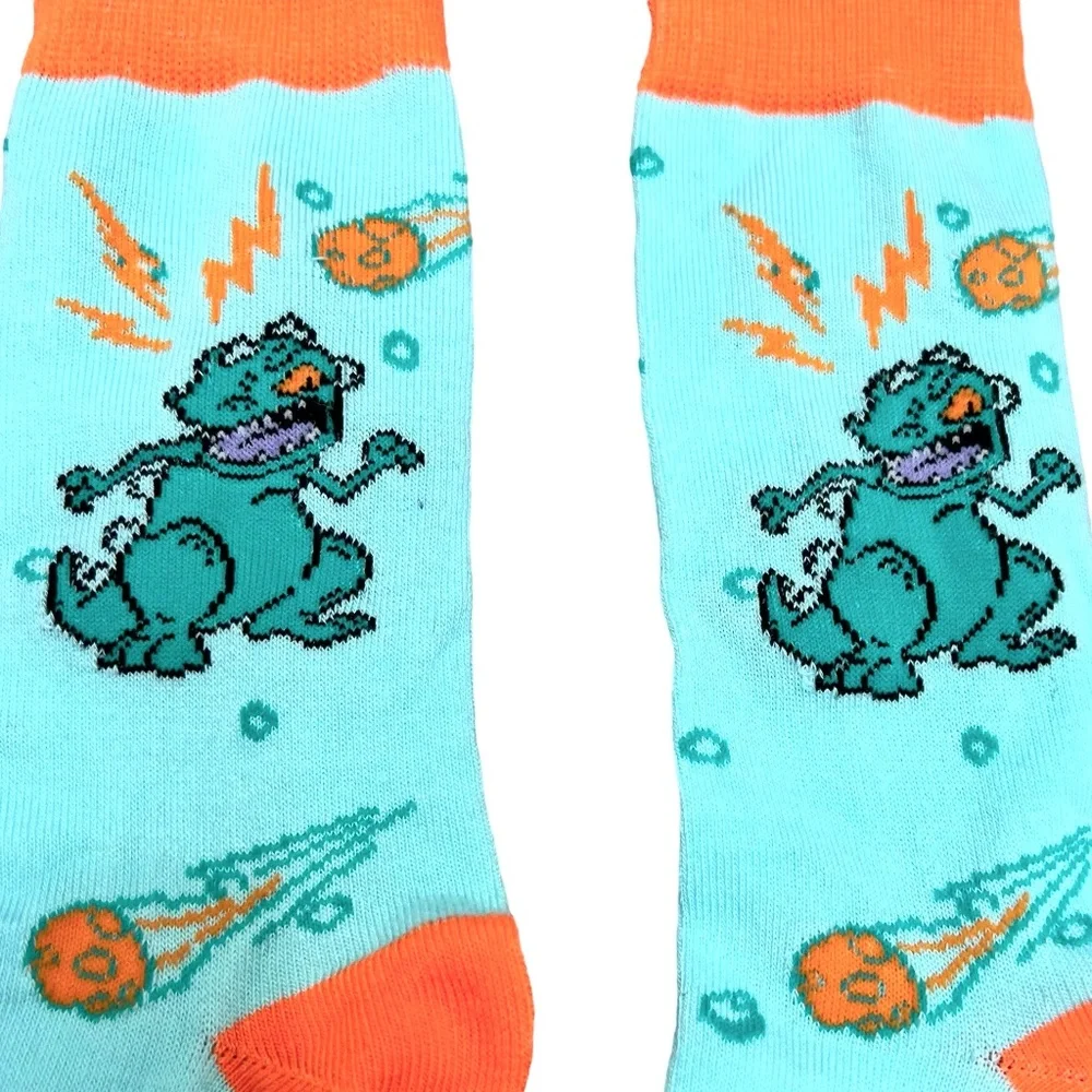 NICKELODEON RUGRATS REPTAR NOVELTY GREEN AND ORANGE CREW SOCKS